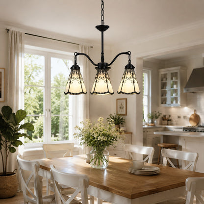 Light yellow chandelier over a dining table