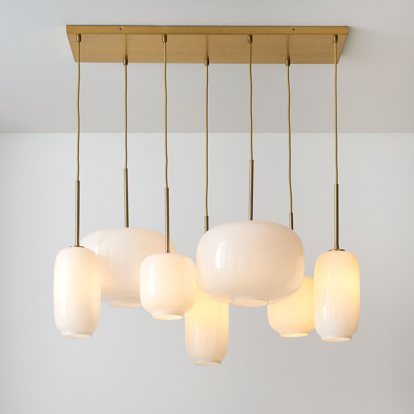 Lumivelle Sculptural 7-Light Chandelier – Adjustable Height Modern Glass Pendant