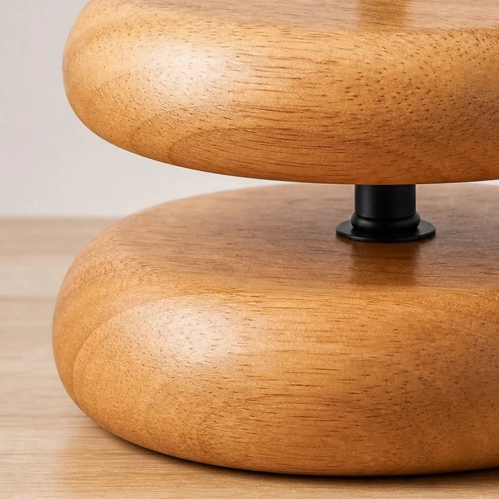 Close detail of smooth rounded wood table lamp base