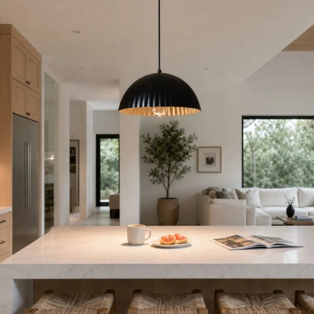 Black metal pendant lamp in an open kitchen and living space