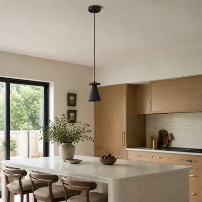 Black walnut pendant light in a bedroom setting