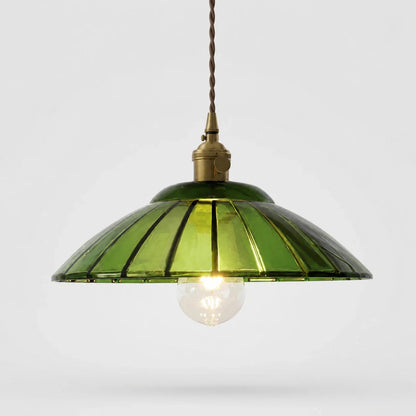Green glass pendant light on white background