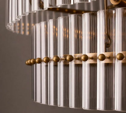 Lumora Kristall-Pendelleuchte – Elegantes Trommelmessing und geschliffenes Glas