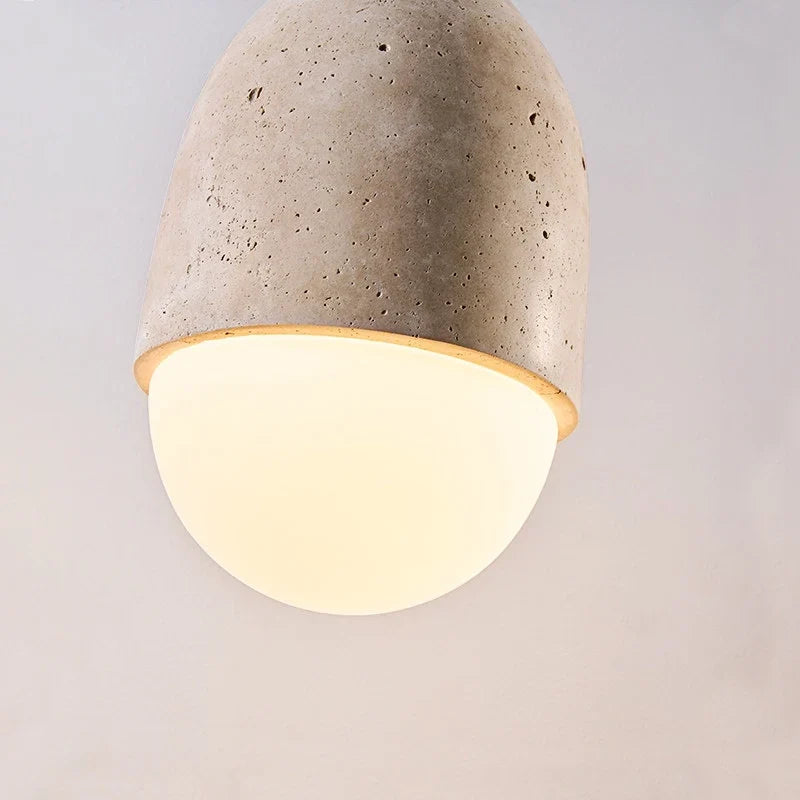 Close view of the cream shade texture and rounded nut-inspired form